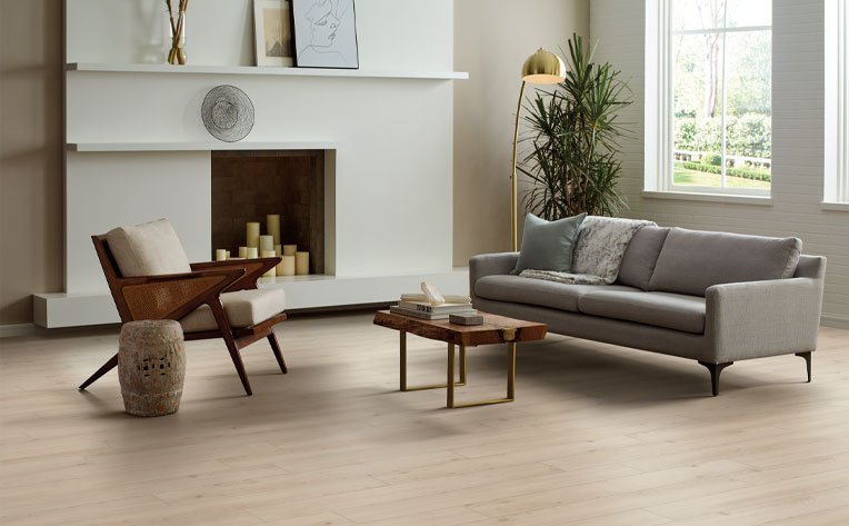 warm tone hardwood flooring in living room with mid century modern decor