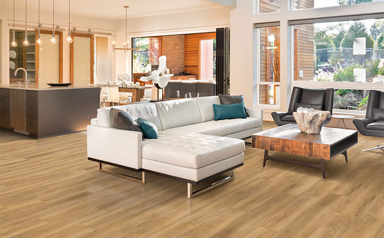 Retro inspired living room with warm toned luxury vinyl plank flooring