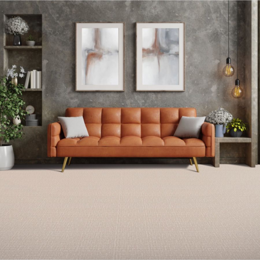 carpet in living room with orange couch