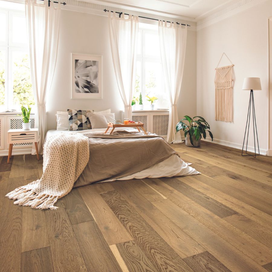 light hardwood floors in a bright Knoxville bedroom
